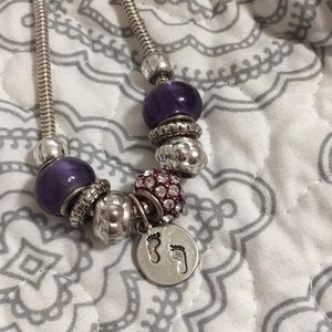 Jewelry - Purple and silver bracelets Jewelry - Purple and silver bracelets